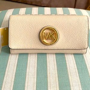 NWT Michael Kors Fulton cream flap continental leather wallet. Authentic